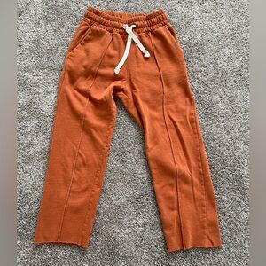 URBAN OUTFITTERS RUSTIC ORANGE RAW HEM WIDE LEG SWEATPANTS. XS GUC